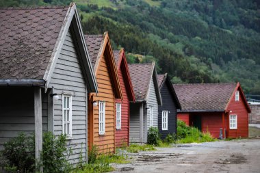 Small cottages in different colors in Sogndal, Norway clipart