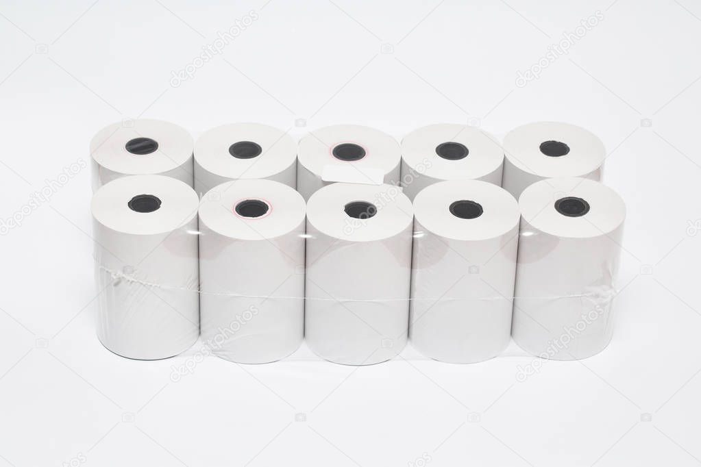 Roll of cash register tape isolated on soft gray background.High resolution photo.