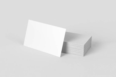 Kadar yumuşak gri arka plan üzerinde boş adının kartvizit yığını alay et. 3D render