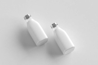 Süt şişeleri Mock-Up yumuşak gri arka plan üzerinde izole. Yüksek çözünürlüklü fotoğraf.