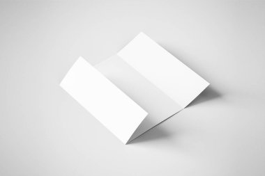 Boş Kağıt Broşür Yumuşak gölgeler ve vurgular ile yumuşak gri arka plan üzerinde mock. Z-fold broşür veya el ilanı.3d render.
