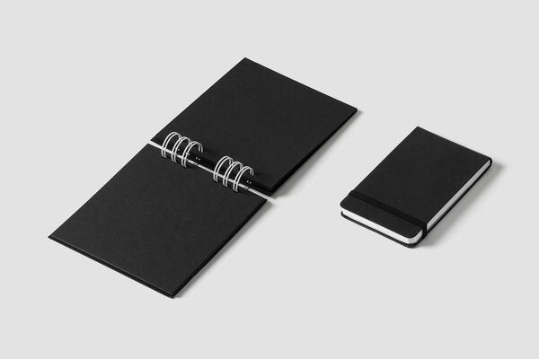 Black notebook mockup on light grey background