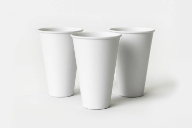 Paper Cups Mock-up for coffee tea isolated on soft gray background.Can be used for your design and branding.