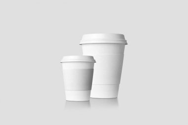 Gerçekçi fotoğraf kağıdı Yumuşak gri arka plan da izole kahve fincanları.3d render