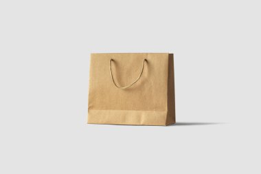 Kahverengi Kağıt Torba Mock kadar açık gri arka plan üzerinde izole. Gerçekçi photo.3d render. Alışveriş çantası.