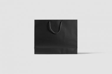 Siyah Kağıt Torba Mock kadar açık gri arka plan üzerinde izole. Gerçekçi photo.3d render