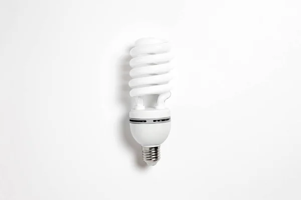 Fluorescent light bulb isolated on white background. Led lamp. High-resolution photo.