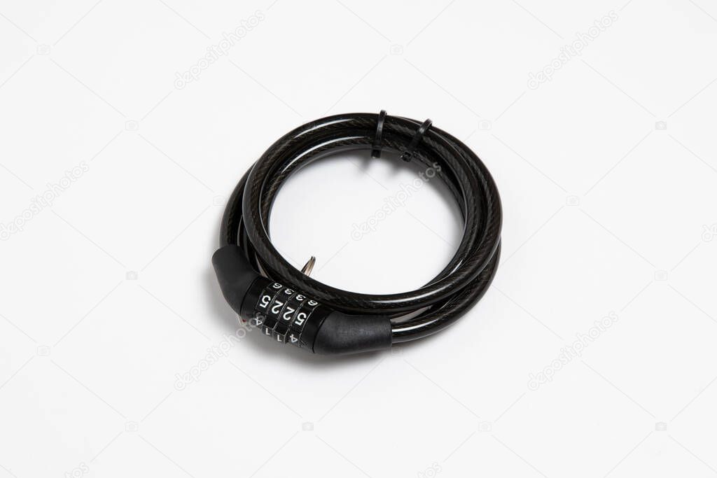 Bicycle code lock cable isolated on white background.High resolution photo.Combination lock for bicycle.