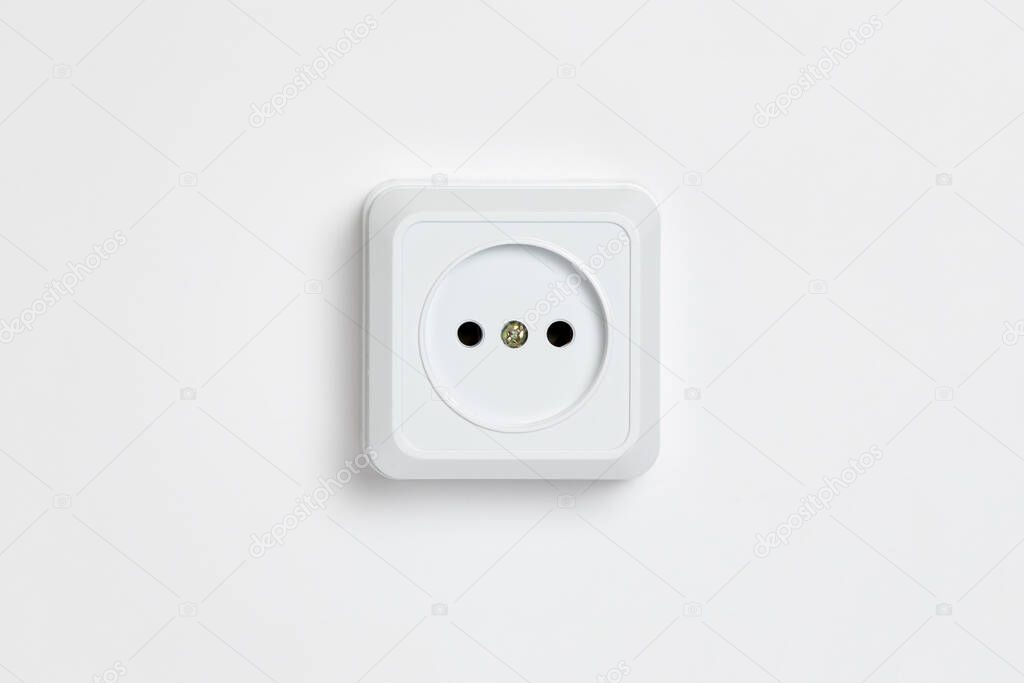 The white socket on white background.Electric plug. European high voltage 220W socket.High-resolution photo.