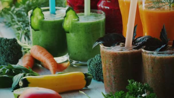 Different kinds of vegetable and fruit smoothies — Stock Video