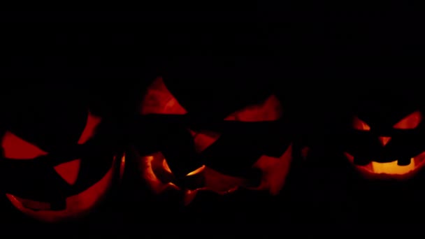 Silhouette of halloween pumpkin with burning fire inside — Stock Video