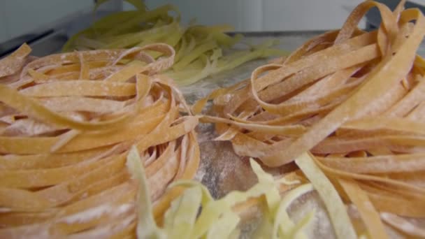 Fresh homemade pasta on metal dish — Stock Video