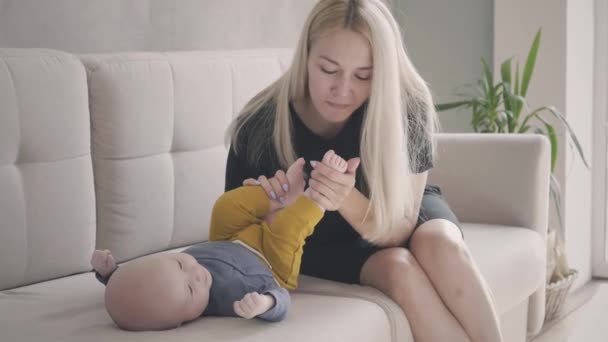 Mom Kissing Baby Feet — Stock Video