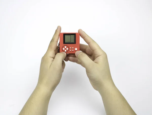 Tetris elinde, adam çalış. Smartphone ve Tetris. Telefon ve oyun konsolu