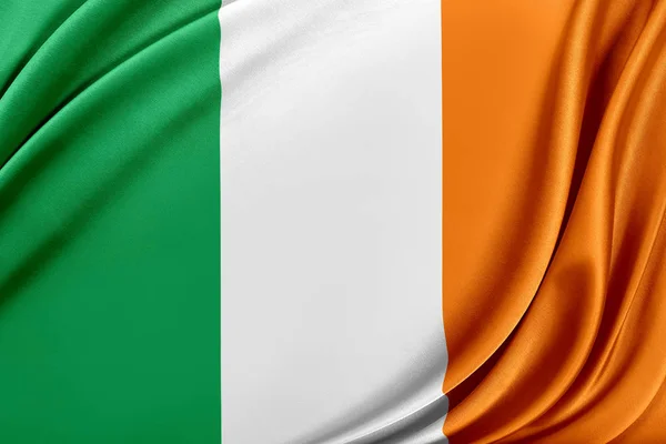 光沢のあるシルクの質感を持つアイルランドの旗. — ストック写真