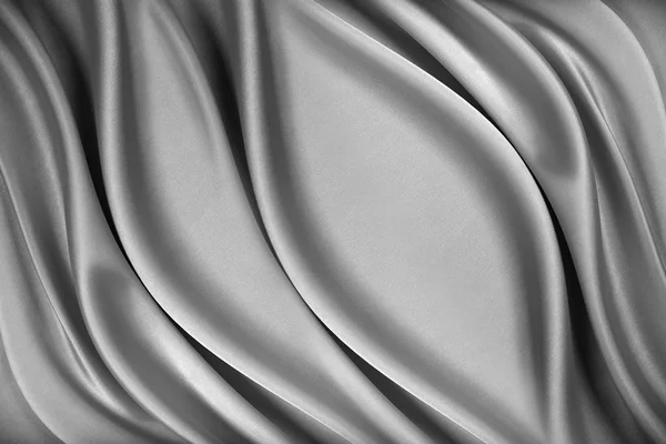 Silver silk texture of satin background abstract .