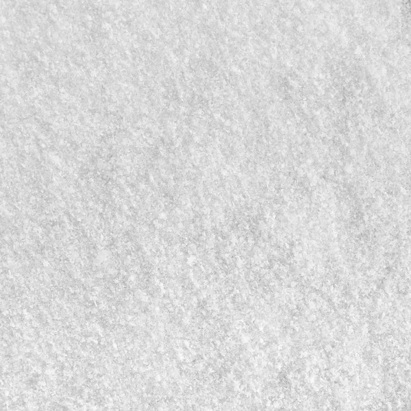 Texture of white snow as a background.