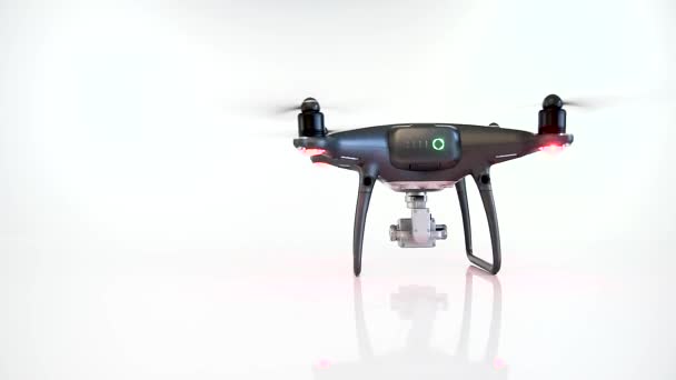 Drone met camera landing op een witte achtergrond zwart. — Stockvideo