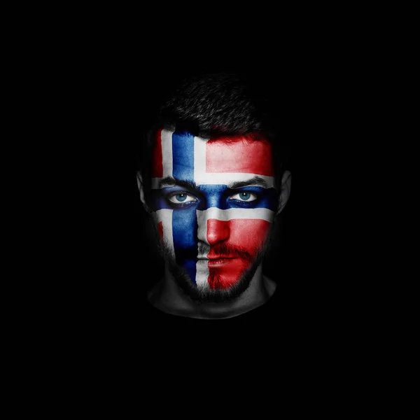 Flag of Norway painted on a face of a man. — Stock Photo, Image