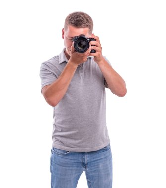 Beyaz kamera ile fotoğrafçı.