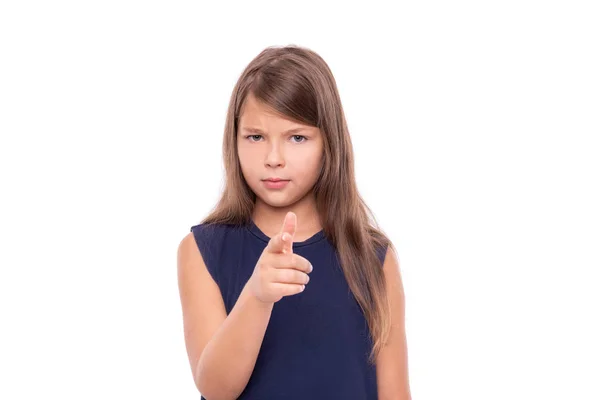 Little girl points her finger at you isolated on white. — Stock Photo, Image