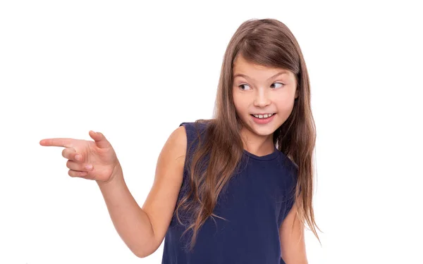Little girl shows a finger to the side. — Stock Photo, Image