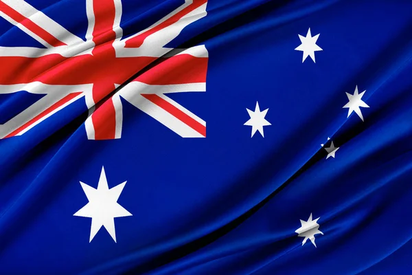 Kleurrijke Australische vlag wapperend in de wind. — Stockfoto