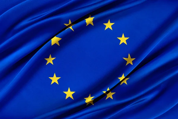 Bandeira colorida da União Europeia acenando ao vento — Fotografia de Stock