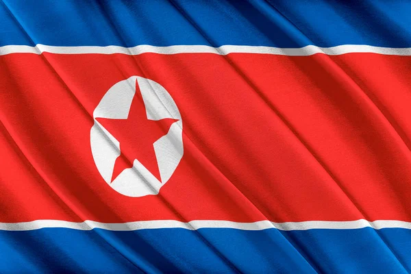 Colorata Corea del Nord bandiera sventola nel vento. — Foto Stock