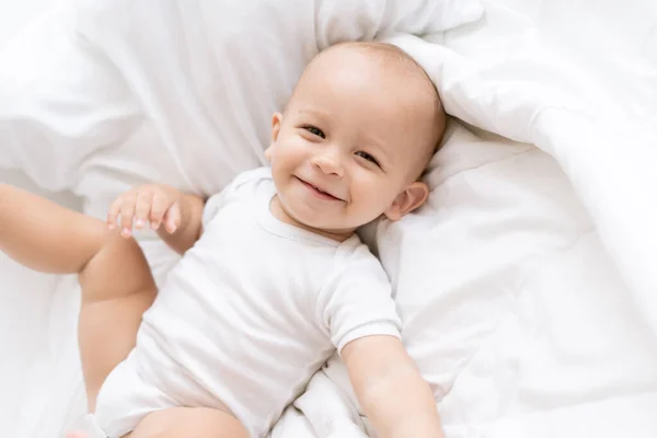 Happy Little Boy White Bed — Stock Photo, Image