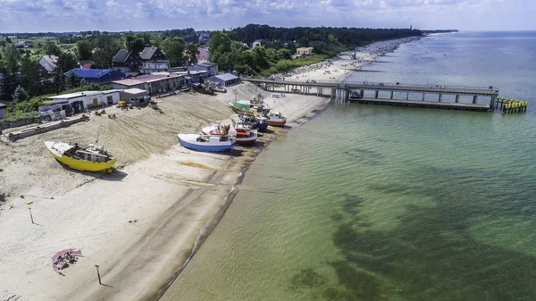 stock image Fishing boats standing on the beach in the port and summer resort in Chlop