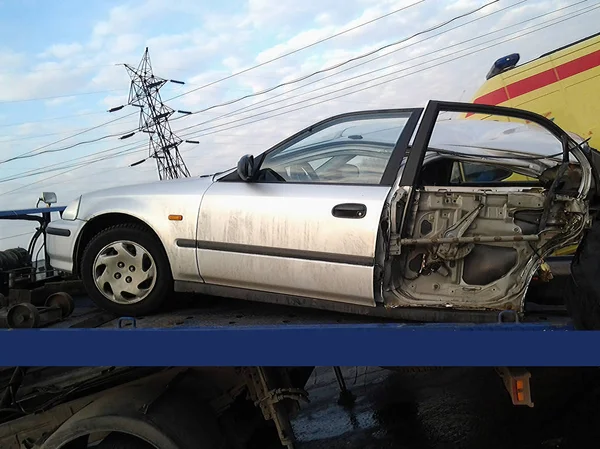 Street racer tore his car apart. Front end and roof separately.