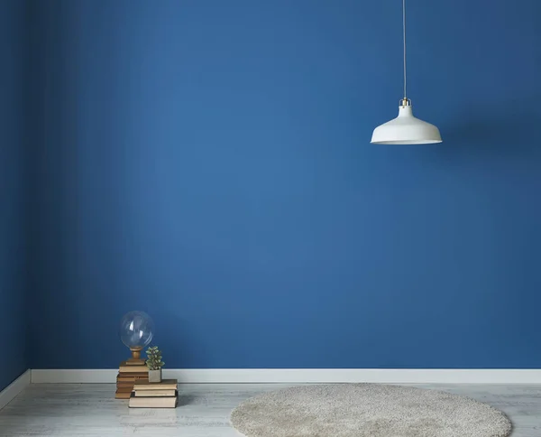 dark blue wall and old books