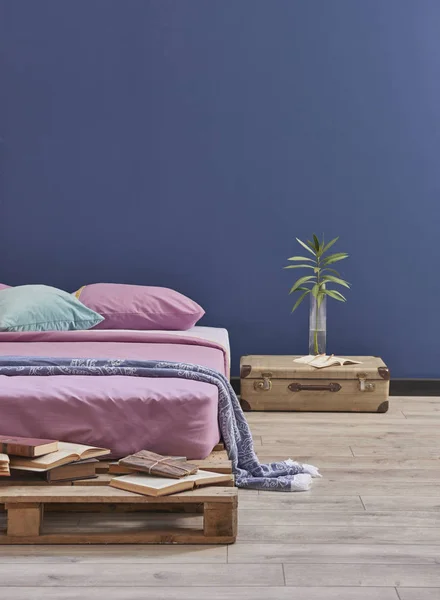 bed room interior with pink bed . Pallet detail new style bed