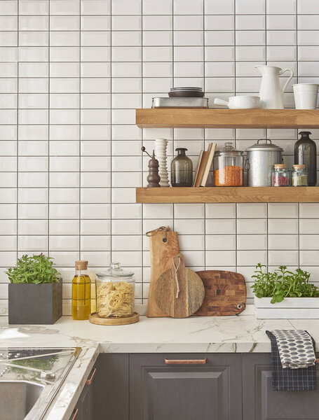 Background white table with modern kitchen accessories, interior design