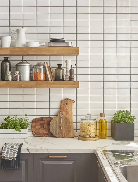 Stylish kitchen counter with set of houseware Stock Photo