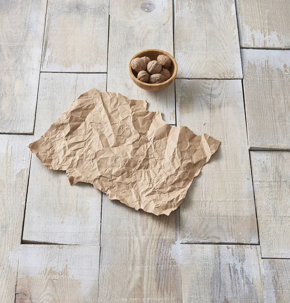 Empty Crumpled Paper Nuts Wooden Floor Background — Stock Photo, Image