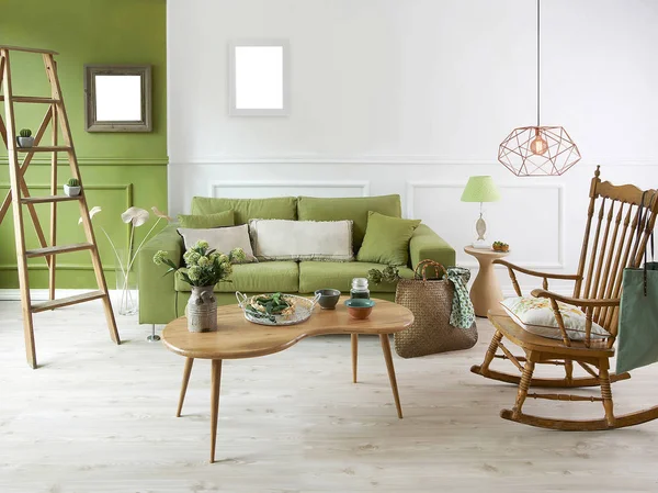 Green and living room concept interior style, sofa middle table and frame.