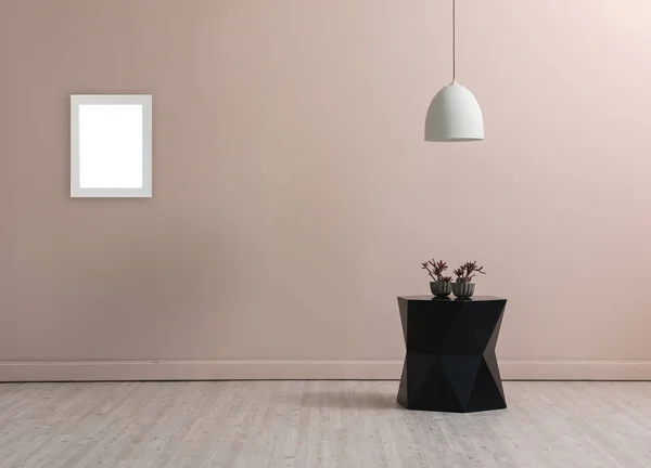cream wall, empty interior and table
