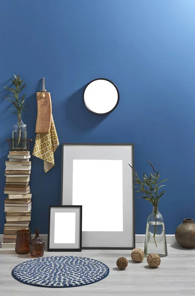 blue wall frame and old books, interior design