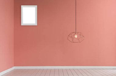 modern lamba ve boş konseptli açık pembe renkli duvar