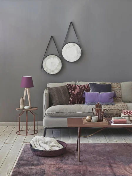 Grey wall background room, sofa carpet and lamp design.
