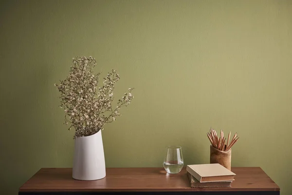 Decorative desk and table style and vase  on the desk interior room with green wall background