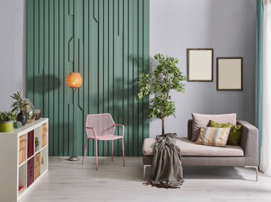 Odada dekoratif yeşil duvar sandalye ve kitaplık tarzı