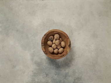 tabakta fındık ve yukarı konsept, mermer gri arkaplan.