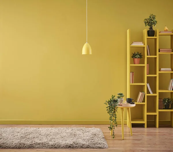 Decorative wall yellow background with bookshelf lamp and carpet style.