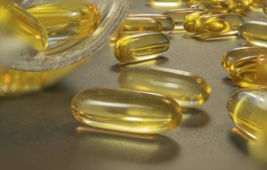 Jelatin kapsül ilaç ile tablo arasında dağılmış.