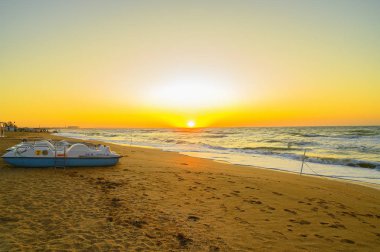 Feodosia, Crimea, Ukraine - September 11, 2019 Sunrise over the Black Sea. clipart