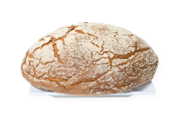 Runde Braune Brotlaibe Mit Mehl Auf Einem Weißen Quadratischen Teller — Stockfoto