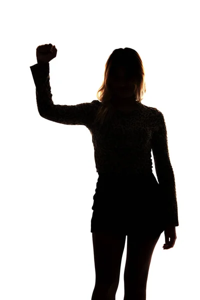 Chica revolucionaria con el brazo en alto